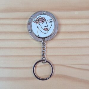 Océliane création accroche sac à main visage femme Océliane création accroche sac à main visage femme